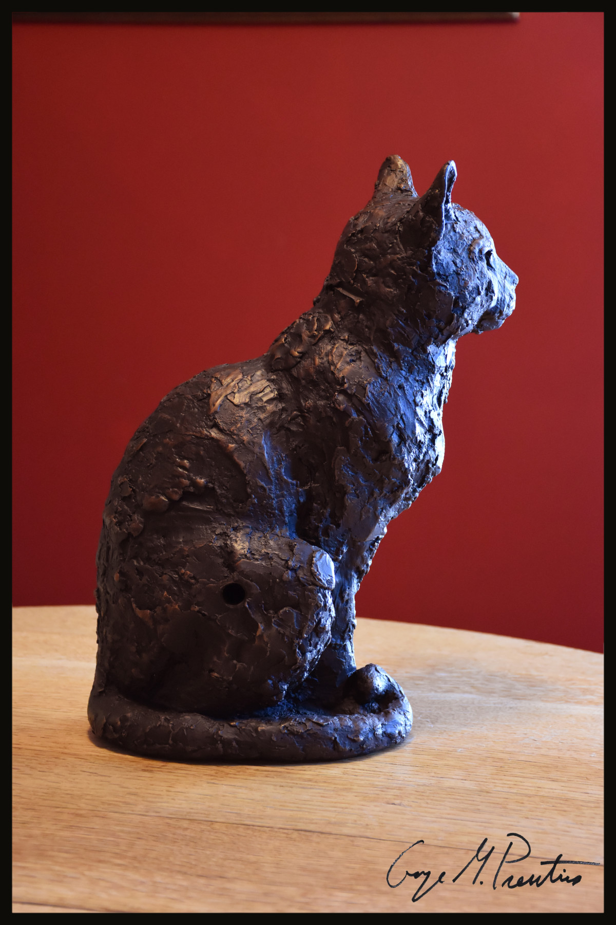 Life Size bronze cats used as andirons in fireplace 